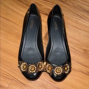 Melissa Black Flats with Gold Floral Accents size 7 USA